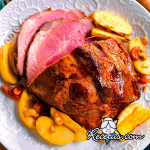 Aguja de cerdo al horno con manzanas, albaricoques secos y anacardos