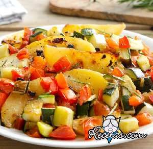 Calabacines patatas y tomates al horno
