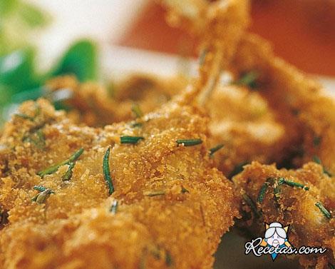 Chuletas de cordero empanadas al rome...