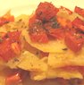 Lasagna de papas, panceta y queso