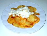 Patatas con crema de huevos