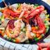 Mariscos y vegetales a la sartén